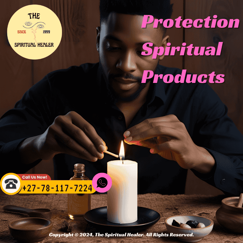 A person anointing a candle with protection oil before lighting it during a ritual